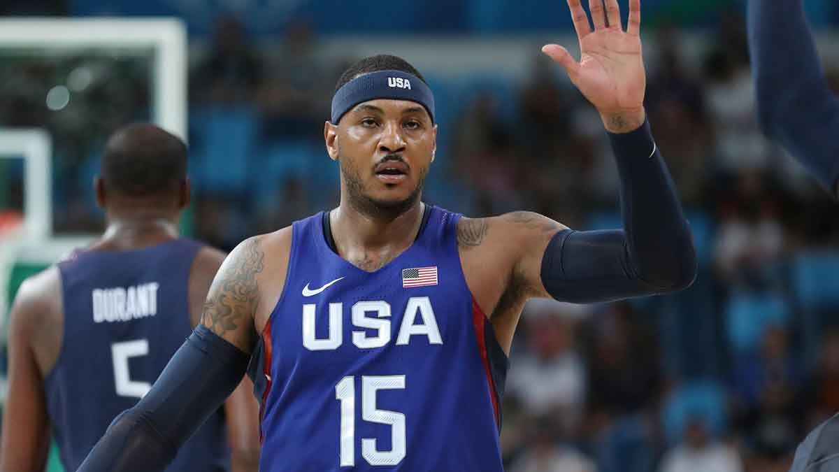 USA forward Carmelo Anthony (15) high fives teammates against Sweden during the men's basketball semifinal match in the Rio 2016 Summer Olympic Games at Carioca Arena 1. 